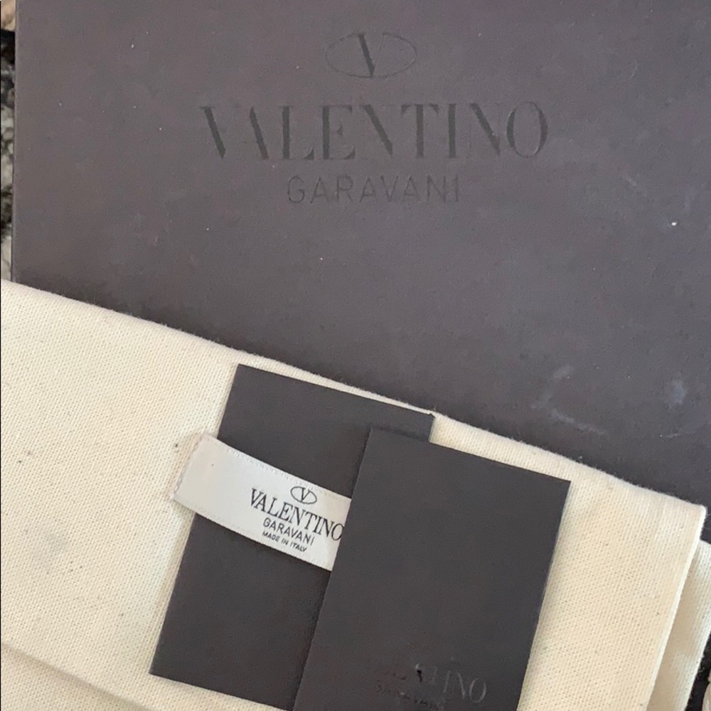 Derby black men’s Valentino shoes.